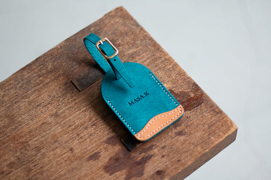 ターコイズグリーンのレザータグチャーム